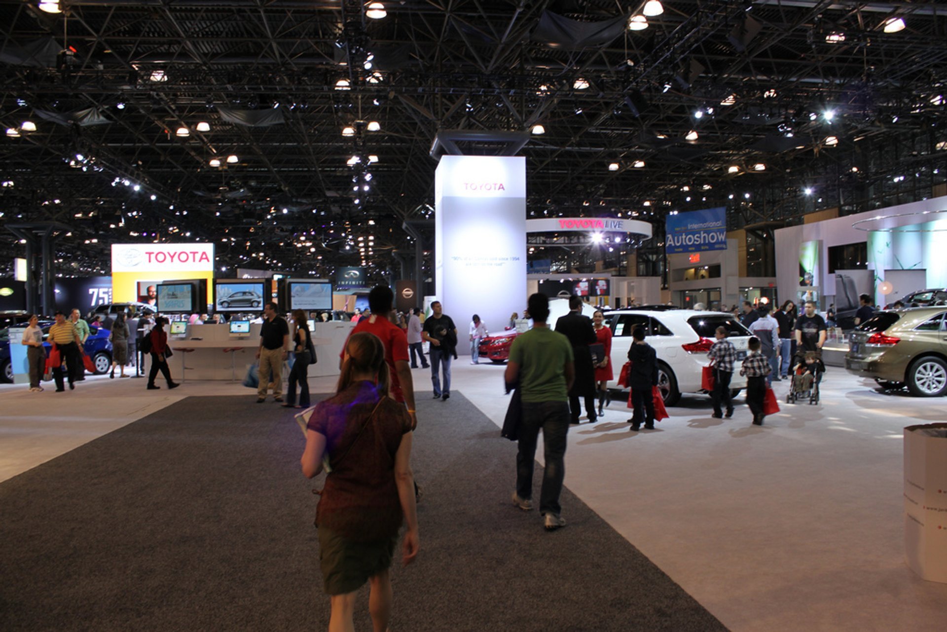 New York International Auto Show, New York Auto Show showroom floor with new cars trucks